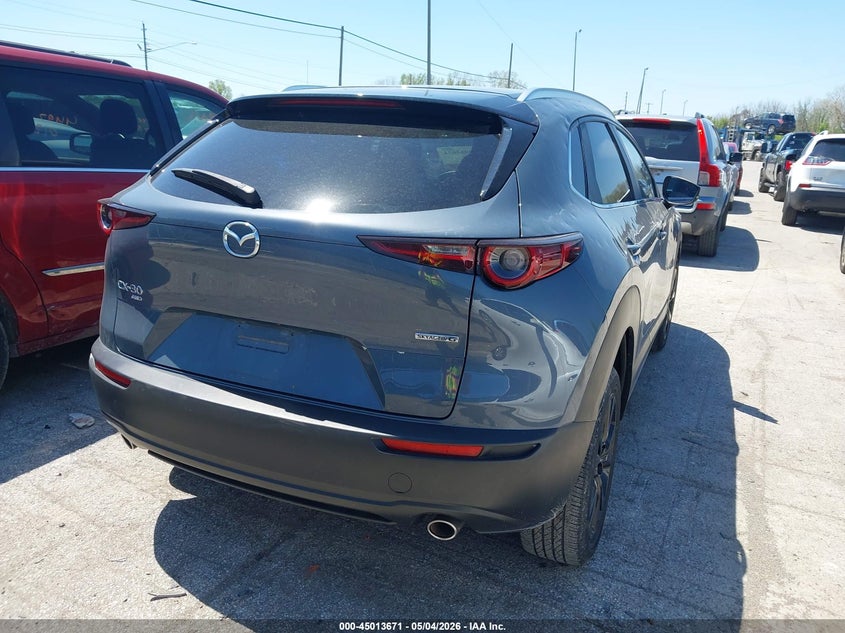 2023 Mazda Cx-30 VIN 3MVDMBCM9PM549976 IAAI salvage auction — HAIL, Salvage (Ohio), sold $25 on 2026-07-21 (photo 4)