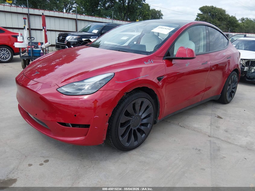 2022 Tesla Model y VIN 7SAYGDEF0NF382352 IAAI salvage auction — SIDE, Salvage Title, sold $10,600 on 2026-07-12 (photo 2)