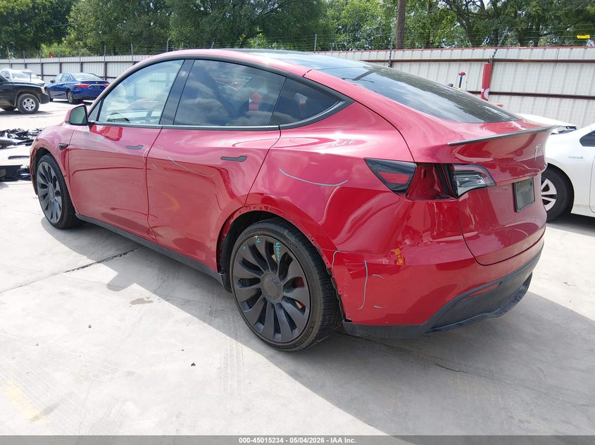 2022 Tesla Model y VIN 7SAYGDEF0NF382352 IAAI salvage auction — SIDE, Salvage Title, sold $10,600 on 2026-07-12 (photo 3)