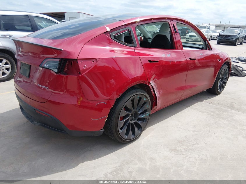 2022 Tesla Model y VIN 7SAYGDEF0NF382352 IAAI salvage auction — SIDE, Salvage Title, sold $10,600 on 2026-07-12 (photo 4)