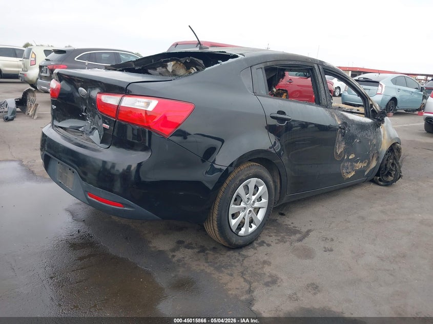 2013 Kia Rio VIN KNADM4A35D6219090 IAAI salvage auction — EXTERIOR BURN, Non-Repairable (Arizona), sold $225 on 2026-07-07 (photo 4)