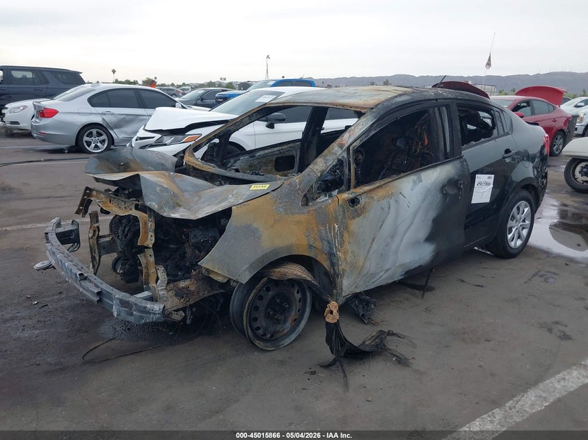 2013 Kia Rio VIN KNADM4A35D6219090 IAAI salvage auction — EXTERIOR BURN, Non-Repairable (Arizona), sold $225 on 2026-07-07 (photo 6)