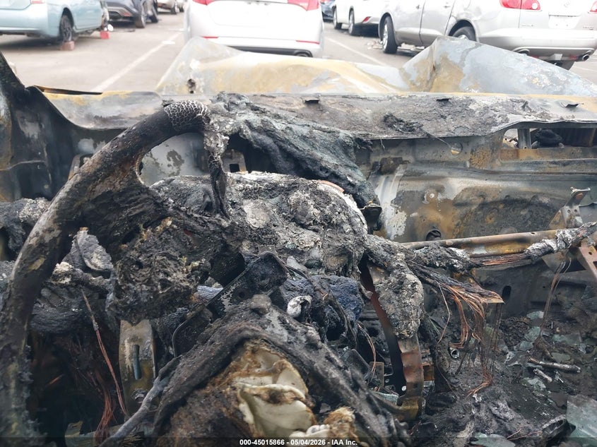2013 Kia Rio VIN KNADM4A35D6219090 IAAI salvage auction — EXTERIOR BURN, Non-Repairable (Arizona), sold $225 on 2026-07-07 (photo 7)