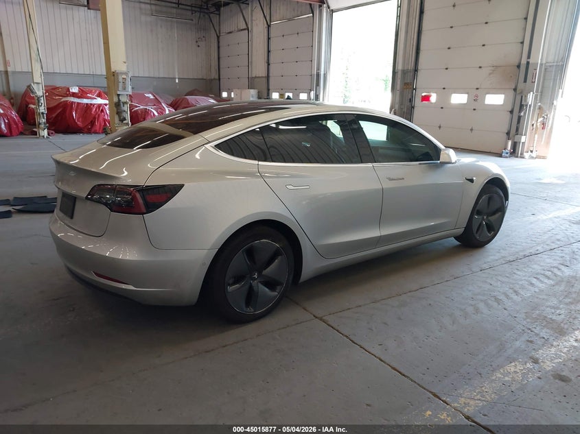 2018 Tesla Model 3 VIN 5YJ3E1EA8JF011594 IAAI salvage auction — LEFT REAR, Salvage (Oregon), sold $5,150 on 2026-07-11 (photo 4)