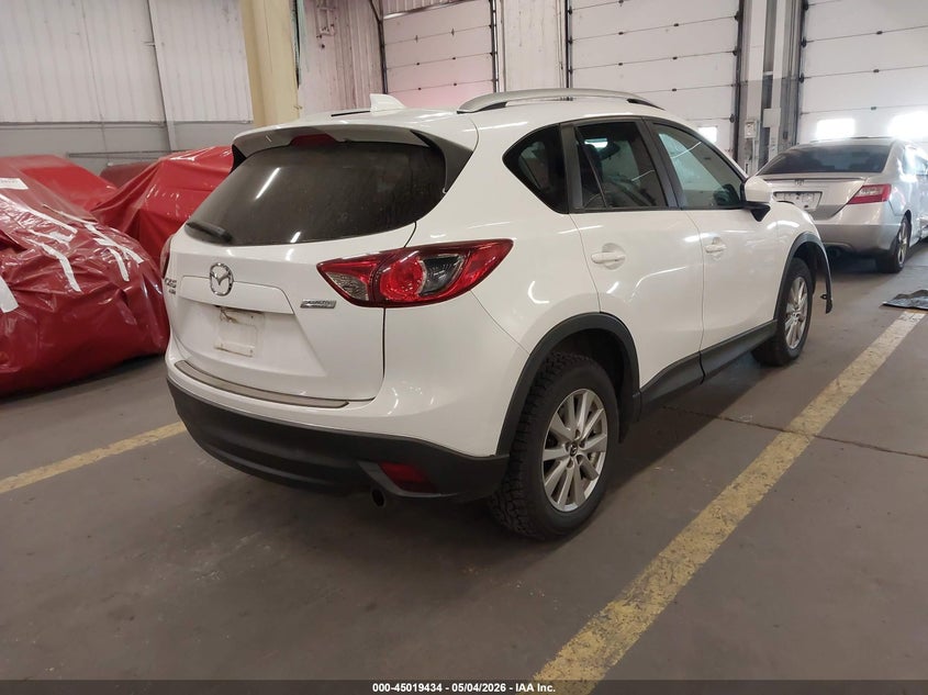2014 Mazda Cx-5 VIN JM3KE4CY0E0403011 IAAI salvage auction — BIOHAZARD/CHEMICAL, Salvage (Oregon), sold $2,000 on 2026-07-30 (photo 4)