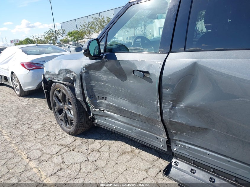 2026 Rivian R1s VIN 7PDSGCBA3TN089073 IAAI salvage auction — LEFT SIDE, Salvage (California), sold $23,600 on 2026-07-09 (photo 6)