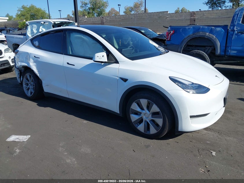 2023 Tesla Model y VIN 7SAYGDEE9PA034752 IAAI salvage auction — LEFT & RIGHT, Salvage Certificate (California), sold $7,100 on 2026-07-10 (photo 1)