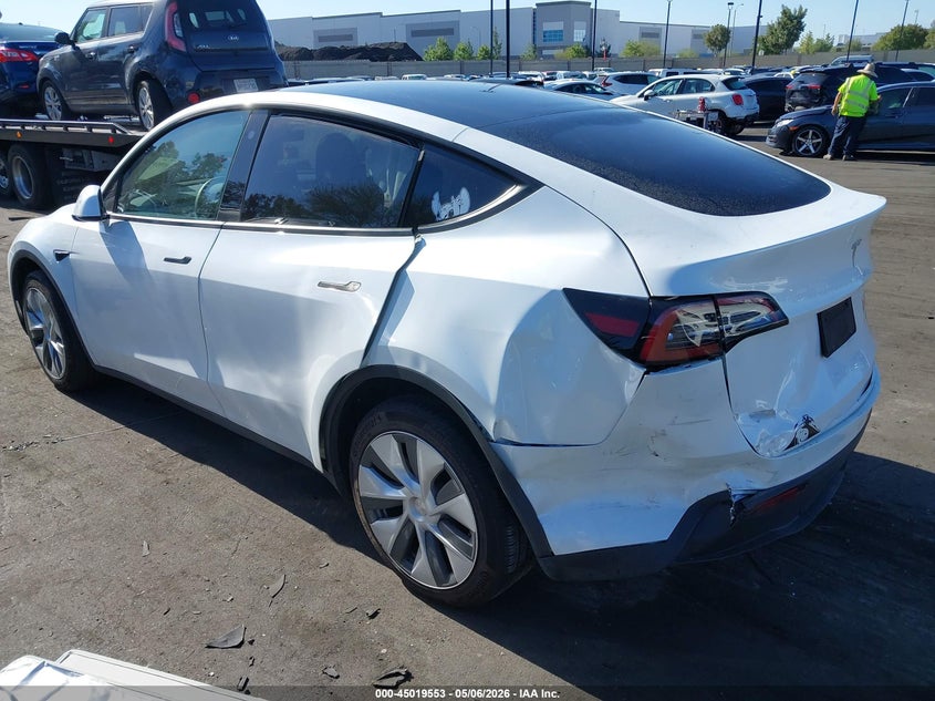 2023 Tesla Model y VIN 7SAYGDEE9PA034752 IAAI salvage auction — LEFT & RIGHT, Salvage Certificate (California), sold $7,100 on 2026-07-10 (photo 3)