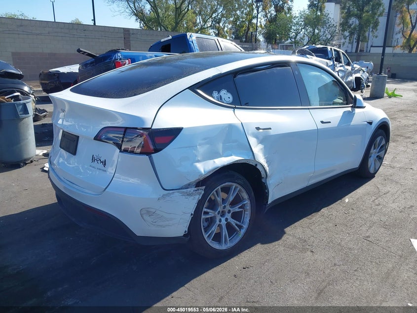 2023 Tesla Model y VIN 7SAYGDEE9PA034752 IAAI salvage auction — LEFT & RIGHT, Salvage Certificate (California), sold $7,100 on 2026-07-10 (photo 4)