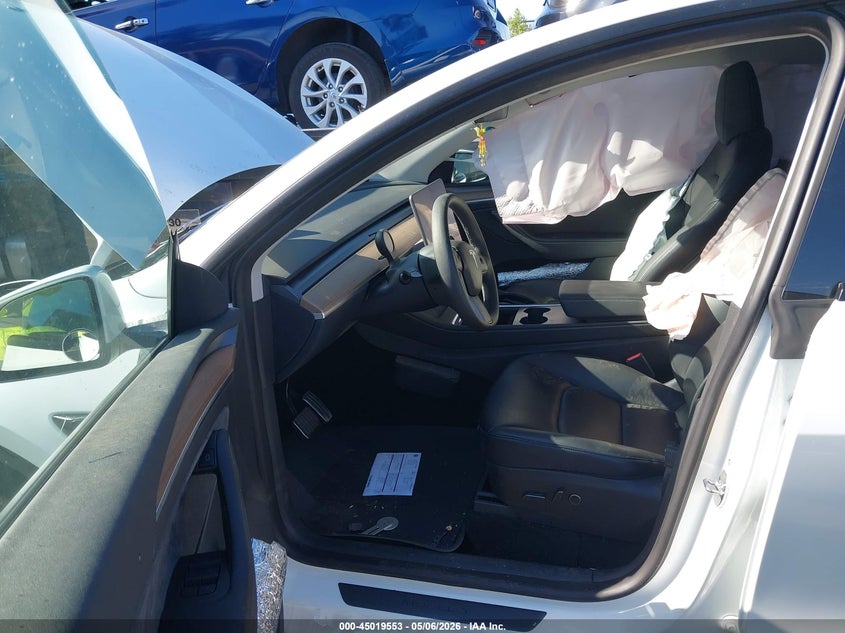 2023 Tesla Model y VIN 7SAYGDEE9PA034752 IAAI salvage auction — LEFT & RIGHT, Salvage Certificate (California), sold $7,100 on 2026-07-10 (photo 5)