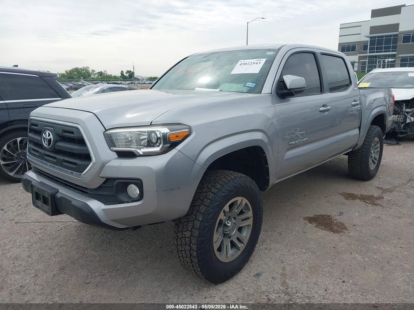 2016 Toyota Tacoma VIN 5TFAZ5CN8GX016012 IAAI salvage auction — STORM DAMAGE, Original (Texas), sold $10,950 on 2026-07-14 (photo 2)