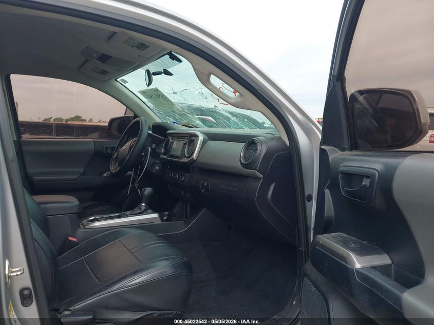 2016 Toyota Tacoma VIN 5TFAZ5CN8GX016012 IAAI salvage auction — STORM DAMAGE, Original (Texas), sold $10,950 on 2026-07-14 (photo 5)