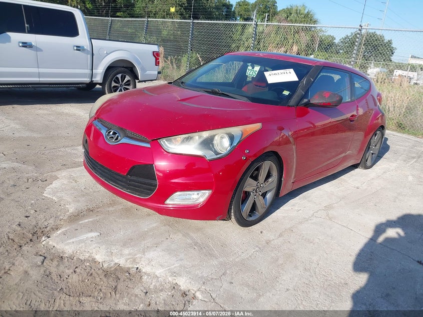 2013 Hyundai Veloster VIN KMHTC6AD0DU126197 IAAI salvage auction — NORMAL WEAR, Clear (Montana), sold $225 on 2026-07-08 (photo 2)