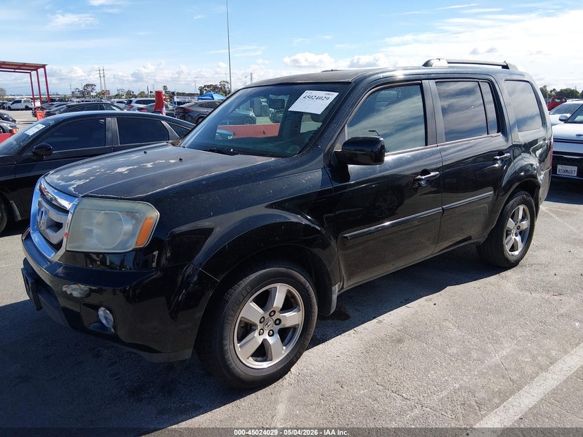 2009 Honda Pilot VIN 5FNYF386X9B027118 IAAI salvage auction — NORMAL WEAR, Salvage (Idaho), sold $500 on 2026-07-09 (photo 2)