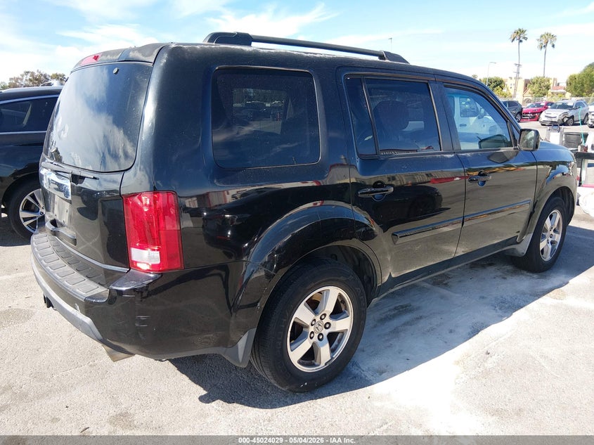 2009 Honda Pilot VIN 5FNYF386X9B027118 IAAI salvage auction — NORMAL WEAR, Salvage (Idaho), sold $500 on 2026-07-09 (photo 4)