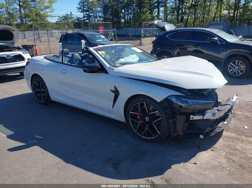 2023 BMW M8 VIN WBSDZ0C00PCL65637 IAAI salvage auction — BIO HAZARD, Salvage Title, sold $22,450 on 2026-08-18 (photo 1)
