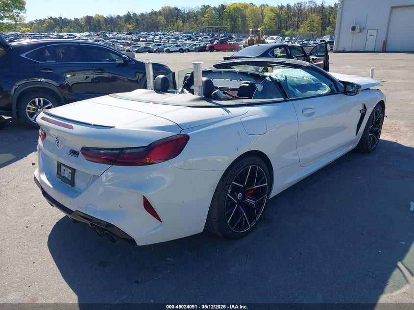 2023 BMW M8 VIN WBSDZ0C00PCL65637 IAAI salvage auction — BIO HAZARD, Salvage Title, sold $22,450 on 2026-08-18 (photo 4)
