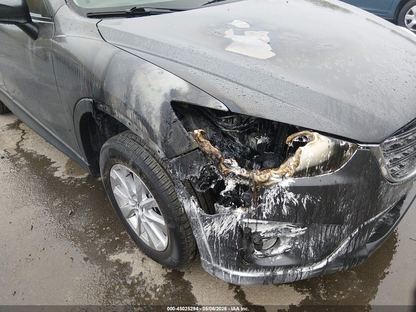 2016 Mazda Cx-5 VIN JM3KE4CY9G0627526 IAAI salvage auction — EXTERIOR BURN, Salvage (Connecticut), sold $1,550 on 2026-07-16 (photo 6)