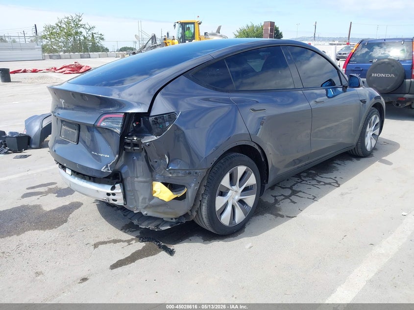 2023 Tesla Model y VIN 7SAYGDEE6PA198153 IAAI salvage auction — REAR END, Salvage (California), sold $11,350 on 2026-07-16 (photo 4)
