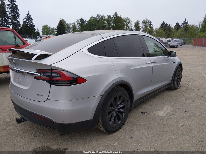 2018 Tesla Model x VIN 5YJXCBE23JF099833 IAAI salvage auction — FRONT & REAR, Clear (Washington), sold $7,600 on 2026-07-29 (photo 4)