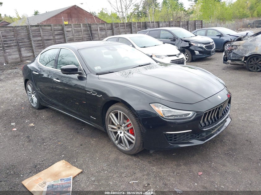 2018 Maserati Ghibli VIN ZAM57YTL5J1285257 IAAI salvage auction — SIDE, Salvage (Massachusetts), sold $11,250 on 2026-08-07 (photo 1)