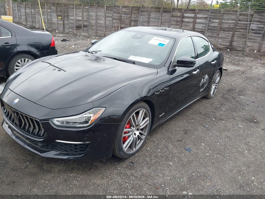 2018 Maserati Ghibli VIN ZAM57YTL5J1285257 IAAI salvage auction — SIDE, Salvage (Massachusetts), sold $11,250 on 2026-08-07 (photo 2)