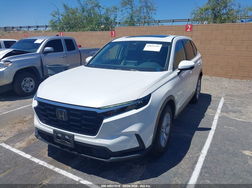 2024 Honda Cr-v VIN 2HKRS4H74RH477220 IAAI salvage auction — SIDE, Salvage (California), sold $12,900 on 2026-07-10 (photo 2)