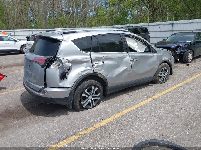 2018 Toyota Rav 4 VIN JTMBFREV9JJ218112 IAAI salvage auction — ALL OVER, Clear (Michigan), sold $2,500 on 2026-07-27 (photo 4)