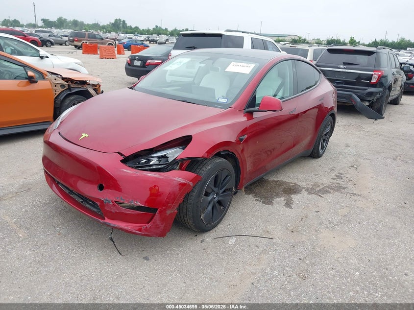 2024 Tesla Model y VIN 7SAYGAEE8RF155311 IAAI salvage auction — FRONT & REAR, Original (Texas), sold $14,400 on 2026-07-09 (photo 2)