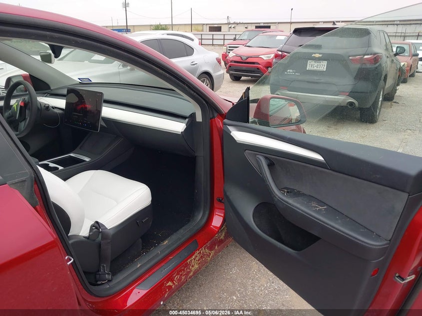 2024 Tesla Model y VIN 7SAYGAEE8RF155311 IAAI salvage auction — FRONT & REAR, Original (Texas), sold $14,400 on 2026-07-09 (photo 5)