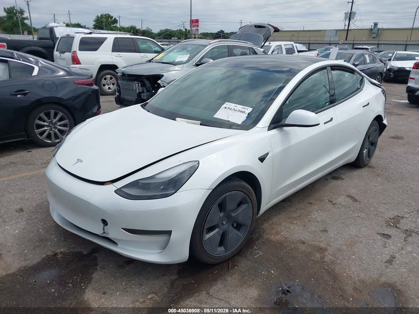 2023 Tesla Model 3 VIN 5YJ3E1EA4PF602370 IAAI salvage auction — RIGHT FRONT, Original (Texas), sold $8,200 on 2026-07-16 (photo 2)