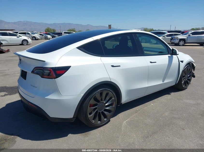 2022 Tesla Model y VIN 7SAYGDEF4NF395556 IAAI salvage auction — RIGHT FRONT, Salvage (Arizona), sold $12,550 on 2026-07-09 (photo 4)