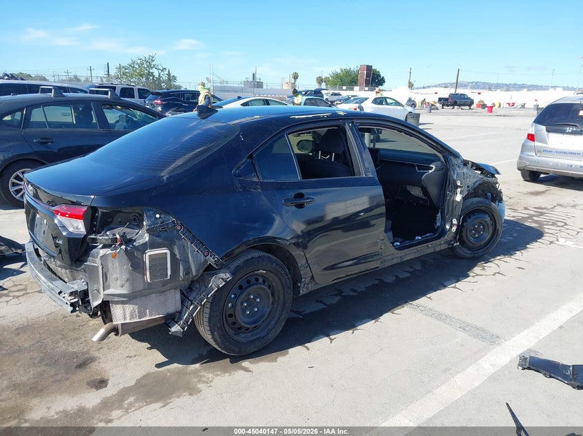 2023 Toyota Corolla VIN JTDB4MEE5PJ011136 IAAI salvage auction — FRONT & REAR, Wait Title, sold $3,450 on 2026-09-26 (photo 4)