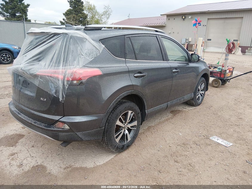 2017 Toyota Rav 4 VIN JTMWFREV0HD095794 IAAI salvage auction — HAIL, Clear (Wisconsin), sold $7,875 on 2026-07-15 (photo 4)