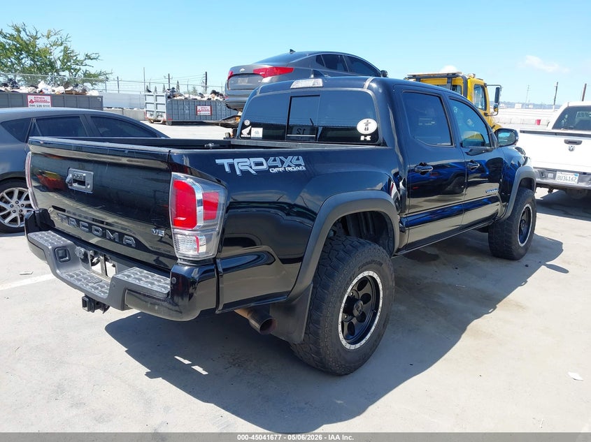 2021 Toyota Tacoma VIN 5TFCZ5AN3MX266748 IAAI salvage auction — LEFT FRONT, Salvage (California), sold $16,400 on 2026-08-02 (photo 4)