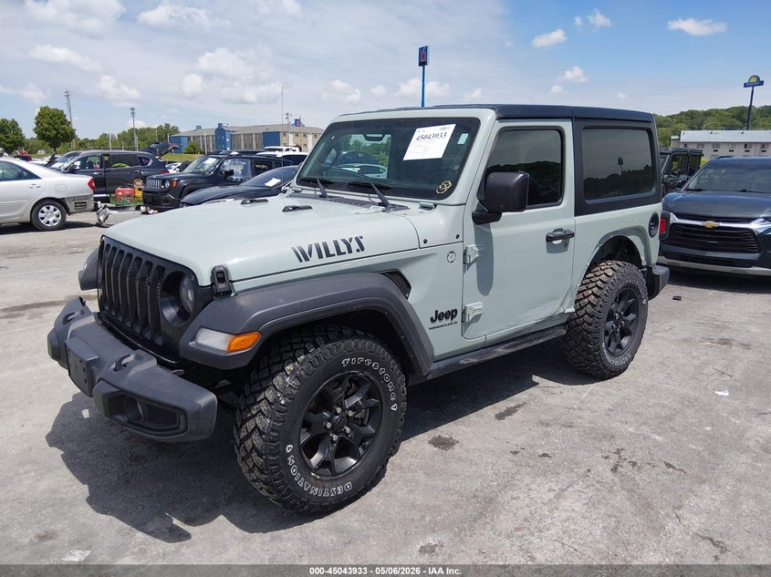 2023 Jeep Wrangler / VIN 1C4HJXAG4PW567131 IAAI salvage auction — LEFT SIDE, Salvage (Illinois), sold $13,200 on 2026-07-28 (photo 2)