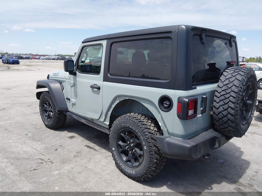 2023 Jeep Wrangler / VIN 1C4HJXAG4PW567131 IAAI salvage auction — LEFT SIDE, Salvage (Illinois), sold $13,200 on 2026-07-28 (photo 3)