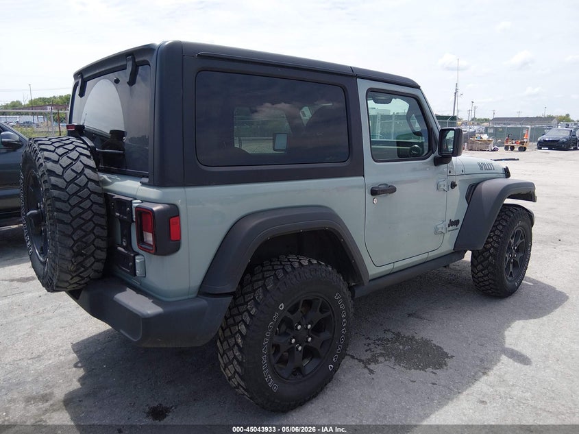 2023 Jeep Wrangler / VIN 1C4HJXAG4PW567131 IAAI salvage auction — LEFT SIDE, Salvage (Illinois), sold $13,200 on 2026-07-28 (photo 4)