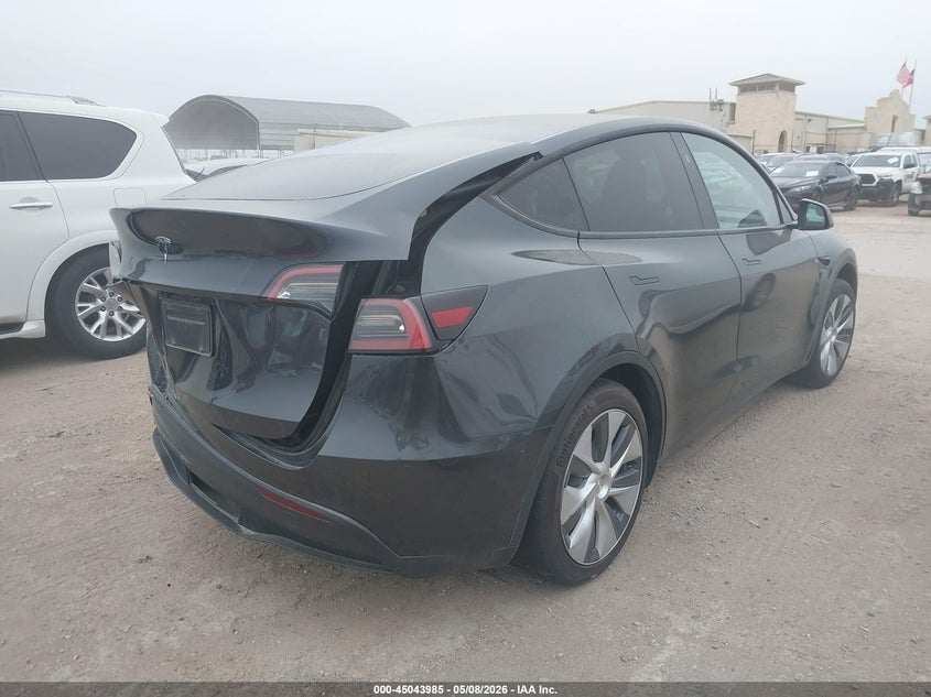 2024 Tesla Model y VIN 7SAYGDED9RF092793 IAAI salvage auction — REAR END, Salvage (Texas), sold $10,550 on 2026-08-24 (photo 4)