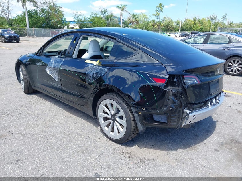 2022 Tesla Model 3 VIN 5YJ3E1EB1NF154188 — IAAI salvage auction photo
