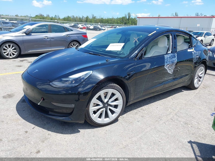 2022 Tesla Model 3 VIN 5YJ3E1EB1NF154188 IAAI salvage auction — REAR END, Rebuildable (Florida), sold $8,700 on 2026-07-30 (photo 2)