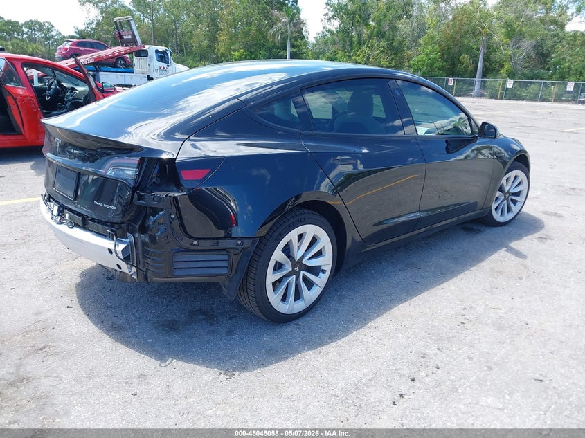 2022 Tesla Model 3 VIN 5YJ3E1EB1NF154188 IAAI salvage auction — REAR END, Rebuildable (Florida), sold $8,700 on 2026-07-30 (photo 4)