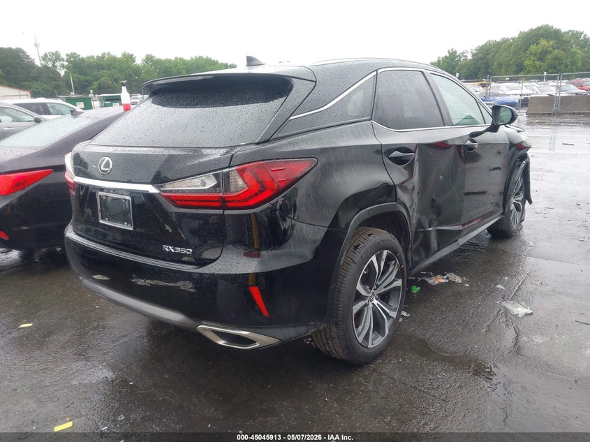 2019 Lexus Rx VIN 2T2ZZMCA4KC147192 IAAI salvage auction — SIDE, Salvage Title, sold $13,775 on 2026-10-12 (photo 4)