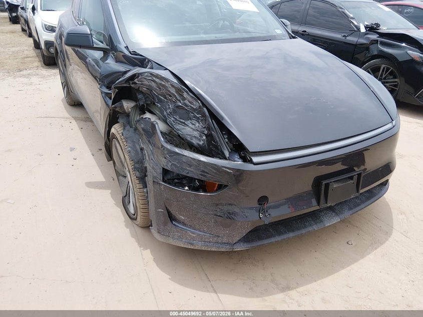 2026 Tesla Model y VIN 7SAYGDEDXTA494522 IAAI salvage auction — RIGHT FRONT, Original (Texas), sold $21,500 on 2026-07-30 (photo 6)