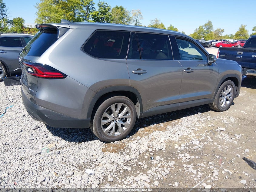 2025 Toyota Highlander VIN 5TDACAB50SS031484 IAAI salvage auction — SIDE, Salvage Title, sold $33,125 on 2026-07-22 (photo 4)