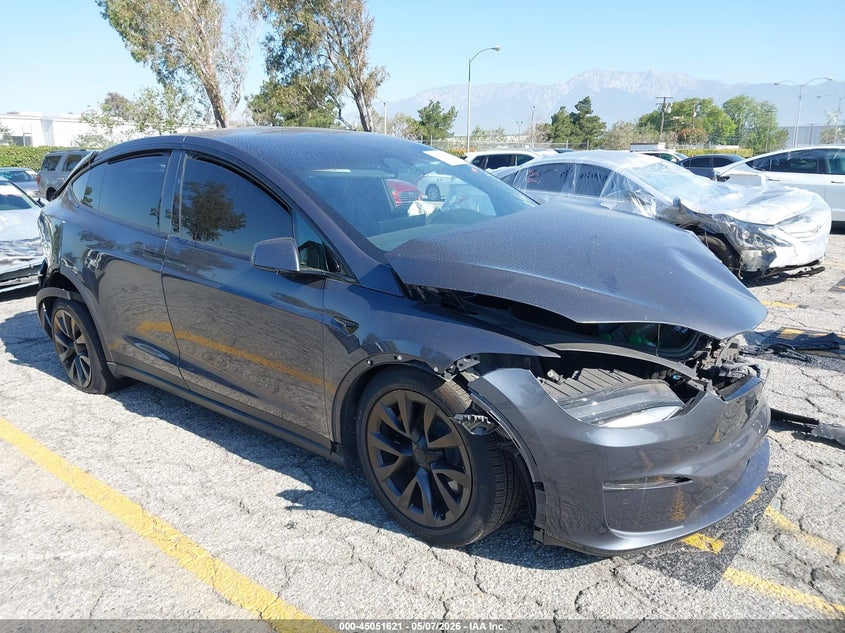 2022 Tesla Model x VIN 7SAXCBE56NF334115 IAAI salvage auction — FRONT & REAR, Salvage (California), sold $7,100 on 2026-07-14 (photo 1)