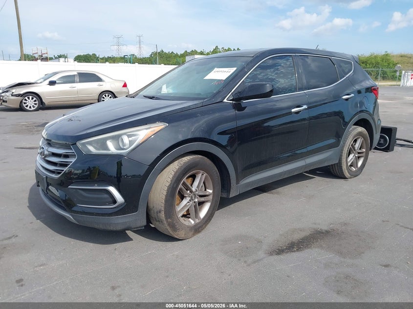 2018 Hyundai Santa fe VIN 5XYZT3LB4JG564310 IAAI salvage auction — SIDE, Rebuildable (Florida), sold $1,700 on 2026-07-13 (photo 2)