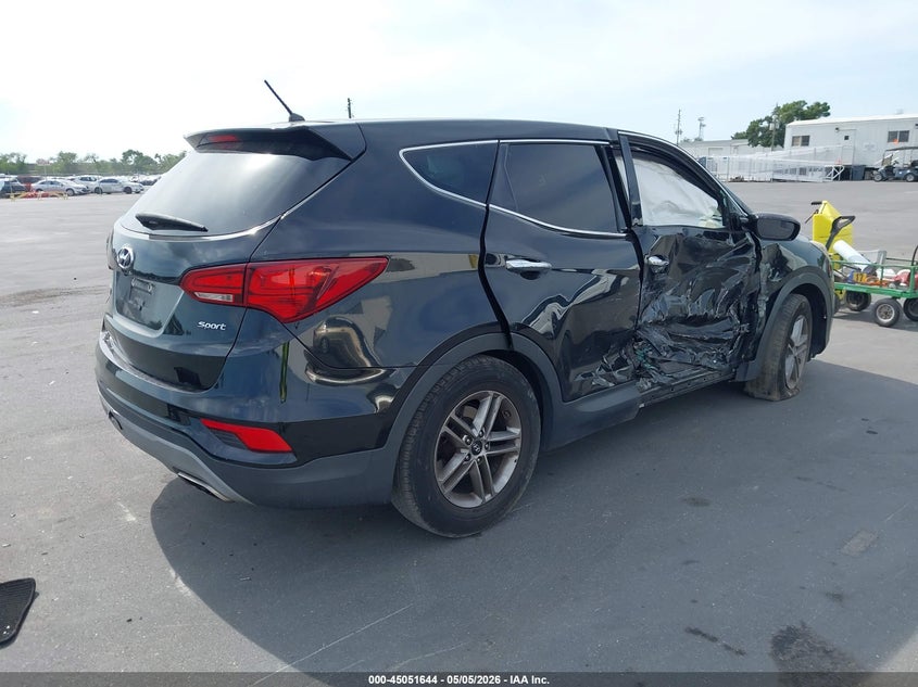 2018 Hyundai Santa fe VIN 5XYZT3LB4JG564310 IAAI salvage auction — SIDE, Rebuildable (Florida), sold $1,700 on 2026-07-13 (photo 4)