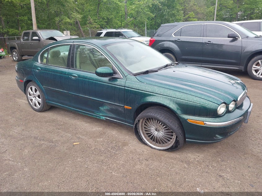 2004 Jaguar X type VIN SAJEA51C74WD67509 IAAI salvage auction — NORMAL WEAR, Salvage (Texas), sold $200 on 2026-07-29 (photo 1)