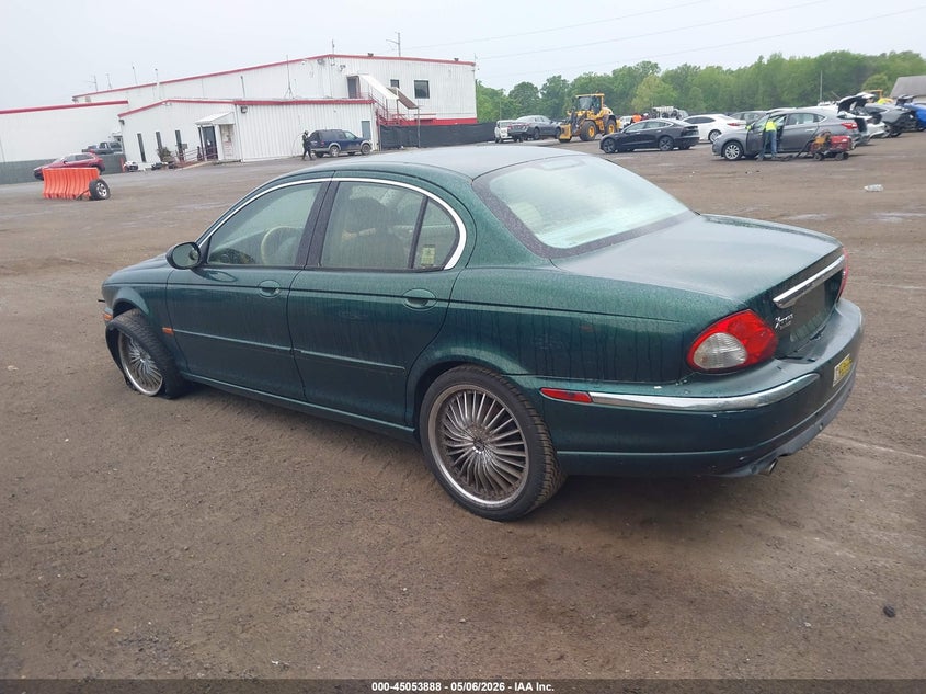 2004 Jaguar X type VIN SAJEA51C74WD67509 IAAI salvage auction — NORMAL WEAR, Salvage (Texas), sold $200 on 2026-07-29 (photo 3)